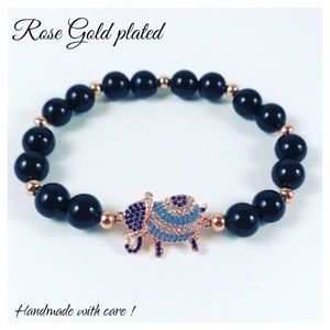 Elephant gold bracelet . Black onyx gemstones beads rose gold plated cz elephant